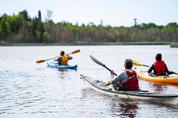 Three people kayaking