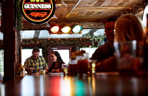 People sitting at a bar.