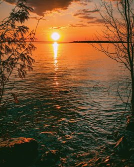 An orange sunset over the lake