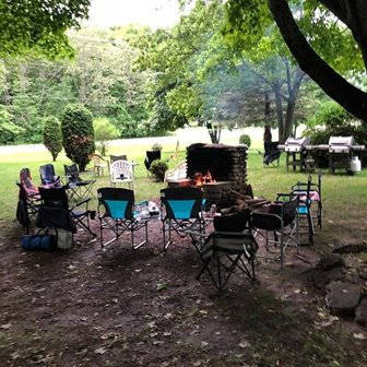 Chairs set up around a fire