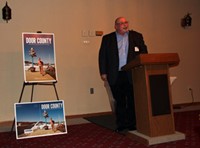 A man standing behind a podium.