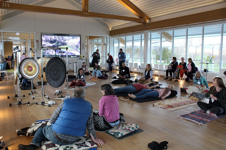 People in a yoga class.